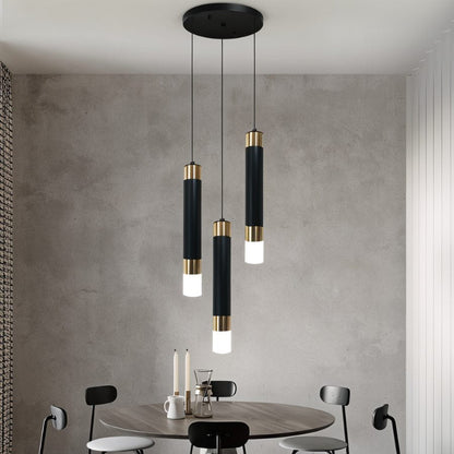 Ivanna Pendant Light by Residence Supply hanging from ceiling with a sleek modern design and metal finish.