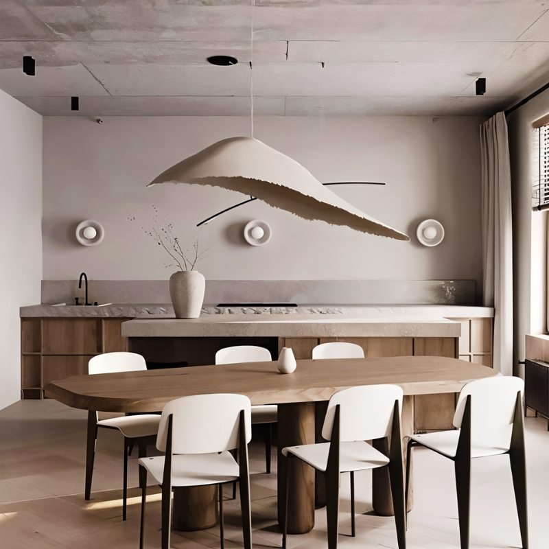 Jairo Pendant Light by Residence Supply hanging from ceiling with a modern design and warm ambient lighting.