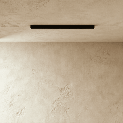 Modern Janae Track Light System by Residence Supply with adjustable spotlights on a sleek metal track.