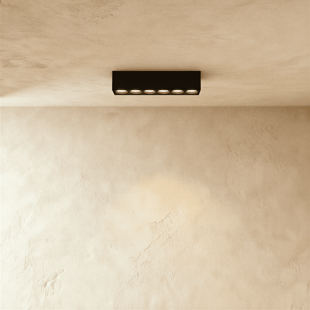 Modern Janae Track Light System by Residence Supply with adjustable spotlights on a sleek track for versatile lighting.