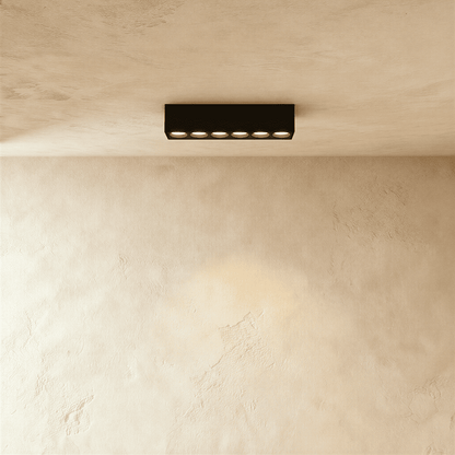 Modern Janae Track Light System by Residence Supply with adjustable spotlights on a sleek track for versatile lighting.