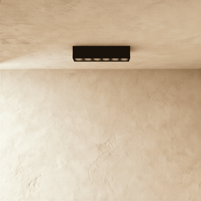 Modern Janae Track Light System by Residence Supply with adjustable spotlights on a sleek track for versatile lighting.