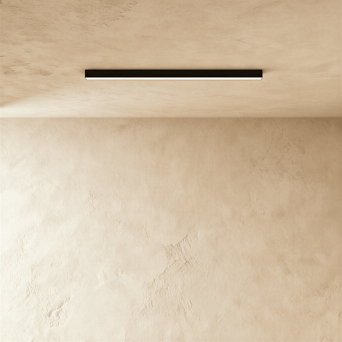 Modern Janae Track Light System by Residence Supply with adjustable spotlights mounted on a sleek track for versatile lighting.