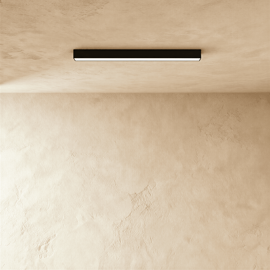 Modern Janae Track Light System by Residence Supply with adjustable spotlights on a sleek metal track.