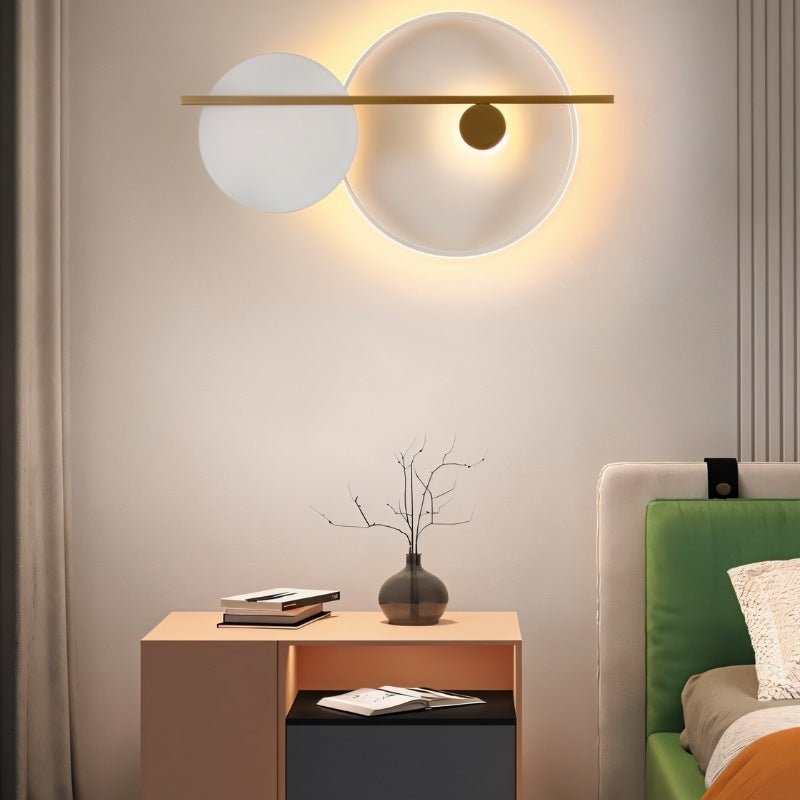 Residence Supply Jaxon Wall Lamp mounted on a wall with a modern design and sleek metal finish.