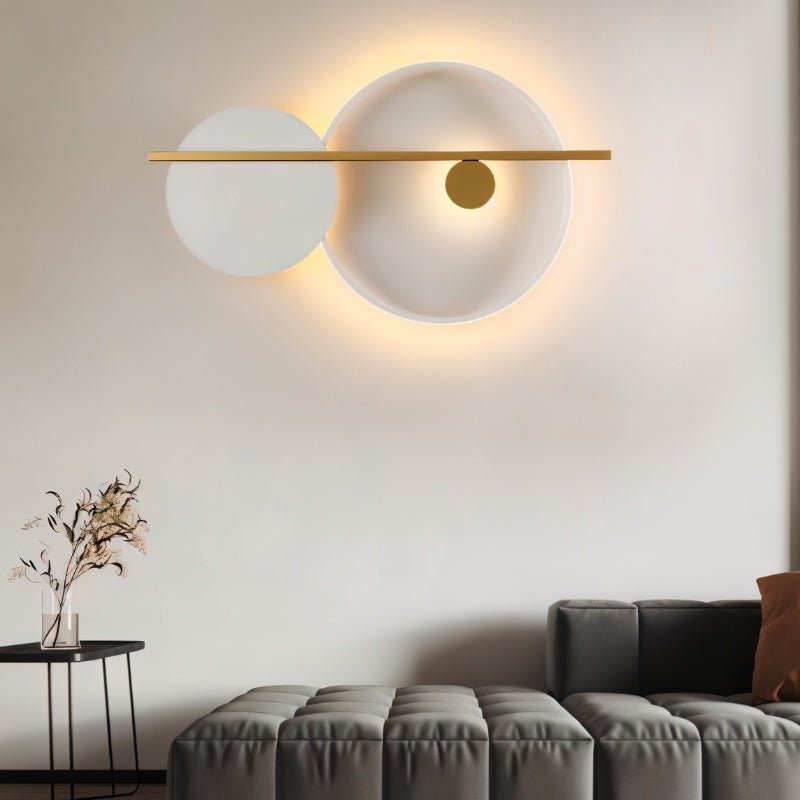 Modern Jaxon Wall Lamp by Residence Supply mounted on a wall with a sleek metal finish for stylish accent lighting.