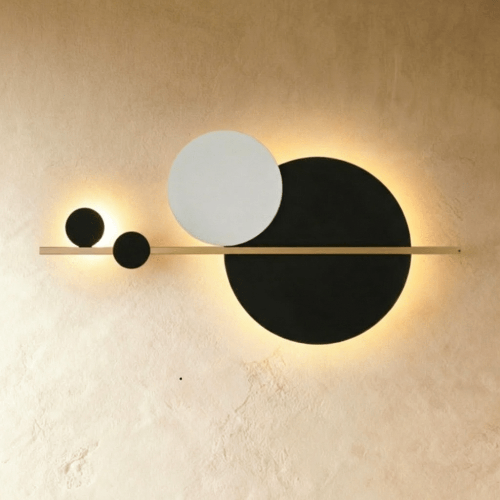 Modern Jaxon Wall Lamp by Residence Supply with sleek metal finish and adjustable arm, mounted on a neutral wall.