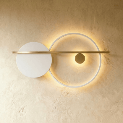 Modern Jaxon Wall Lamp by Residence Supply with sleek metal finish and adjustable arm, mounted on a neutral wall.