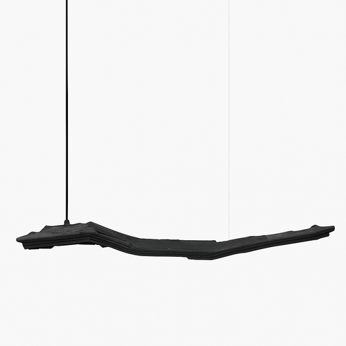 Jennet Pendant Light by Residence Supply with a sleek modern design and clear glass shade hanging from a black metal fixture.