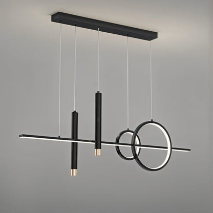 Joffrey Pendant Light by Residence Supply hanging from ceiling with a modern design and clear glass shade.