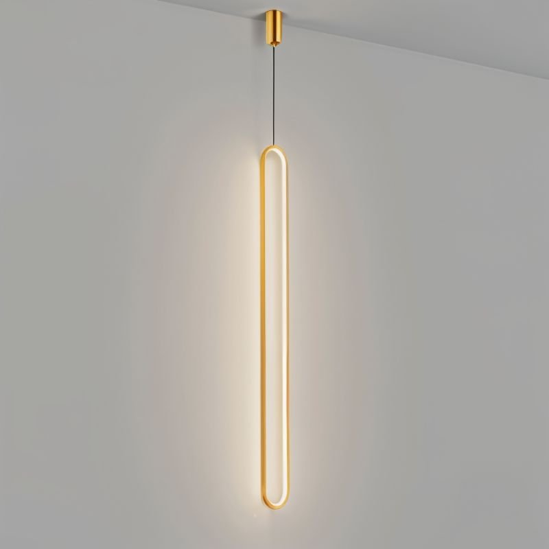 Modern Joffrey Pendant Light by Residence Supply with a sleek metal shade hanging from a cord.