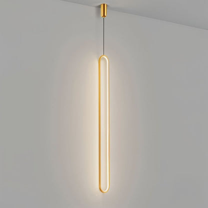 Modern Joffrey Pendant Light by Residence Supply with a sleek metal shade hanging from a cord.