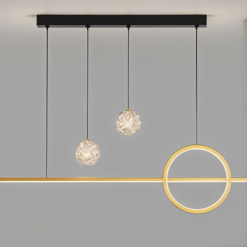 Elegant Joffrey Pendant Light by Residence Supply with a sleek metal finish and modern design, hanging from a ceiling fixture.