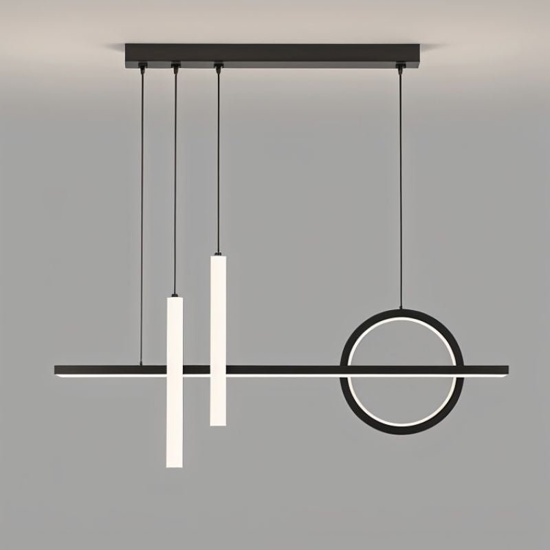 Modern Joffrey Pendant Light by Residence Supply featuring a sleek metal design with a clear glass shade.