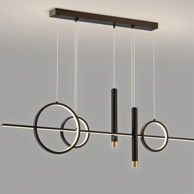 Joffrey Pendant Light by Residence Supply hanging from ceiling with a sleek modern design and warm lighting.
