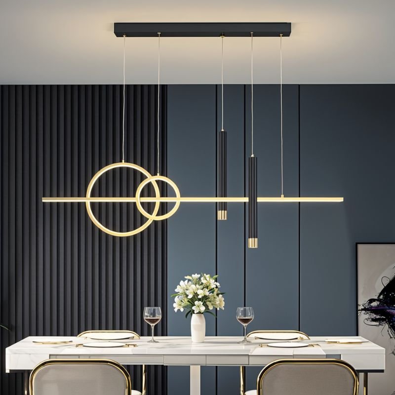 Residence Supply Joffrey Pendant Light featuring a modern design with a sleek metal finish and adjustable hanging cords.