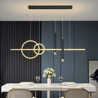 Residence Supply Joffrey Pendant Light featuring a modern design with a sleek metal finish and adjustable hanging cords.