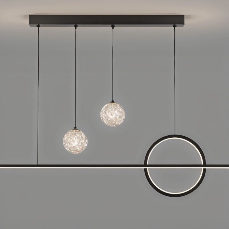 Modern Joffrey Pendant Light by Residence Supply with sleek design and metal finish, hanging from the ceiling.
