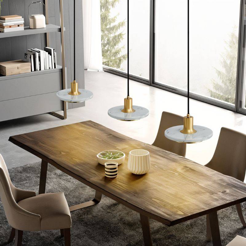 Julian Pendant Light by Residence Supply featuring a sleek modern design with a metal shade and hanging cord.