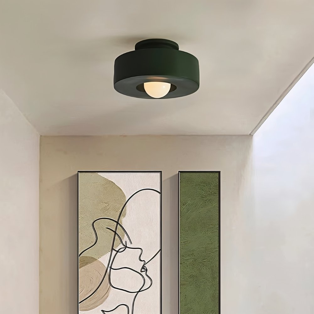 Green Julish ceiling light fixture from Residence Supply, shown installed in a hallway with a modern design.
