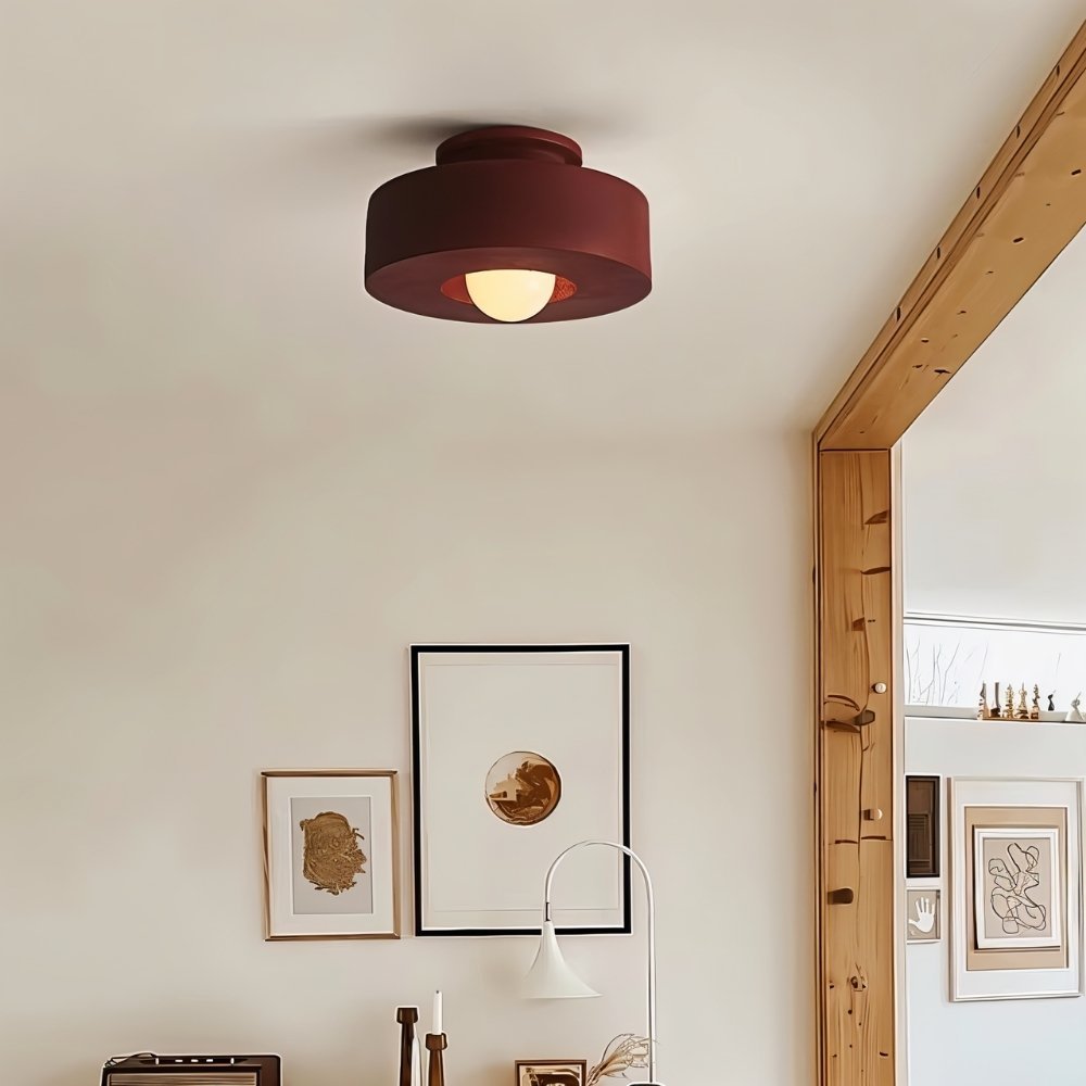 Red Julish ceiling light fixture installed in a room, showcasing modern design and home lighting from Residence Supply.