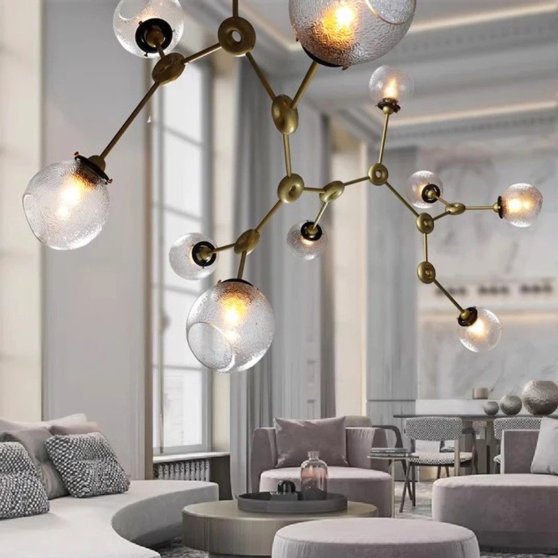 Elegant Jyotish indoor chandelier by Residence Supply with intricate design and warm lighting for stylish home illumination.