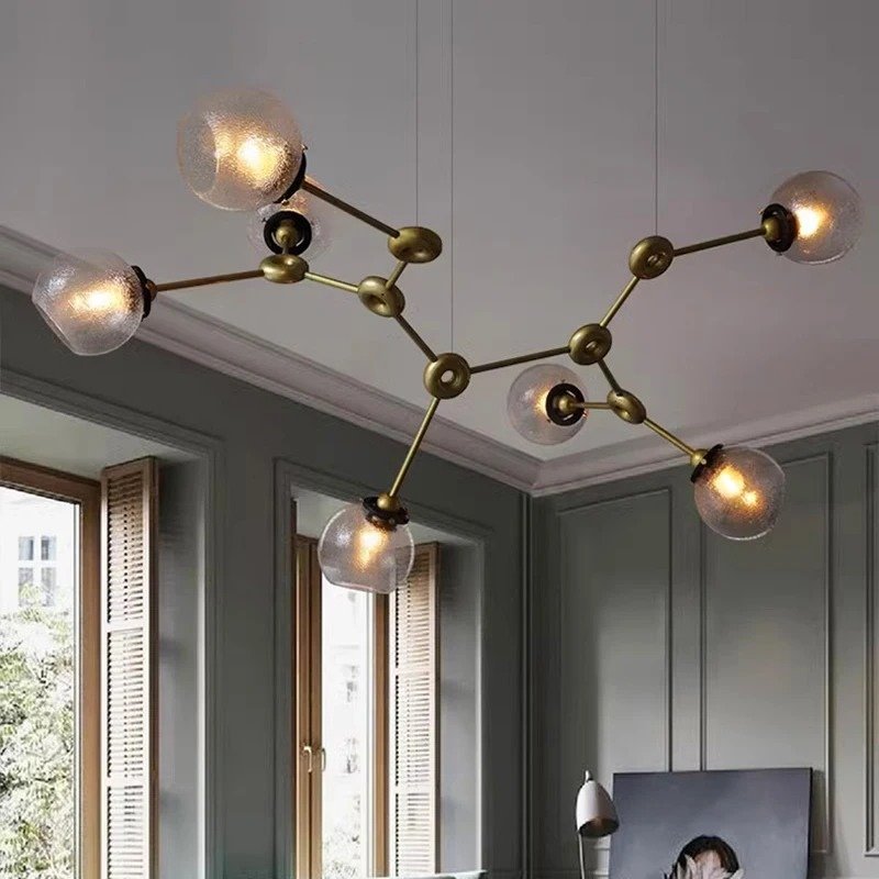 Elegant Jyotish indoor chandelier by Residence Supply with intricate designs and warm lighting for stylish home decor