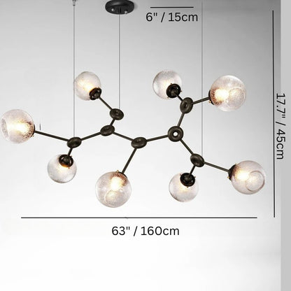 Residence Supply Jyotish Indoor Chandelier with intricate metal design and warm lighting for elegant home decor.