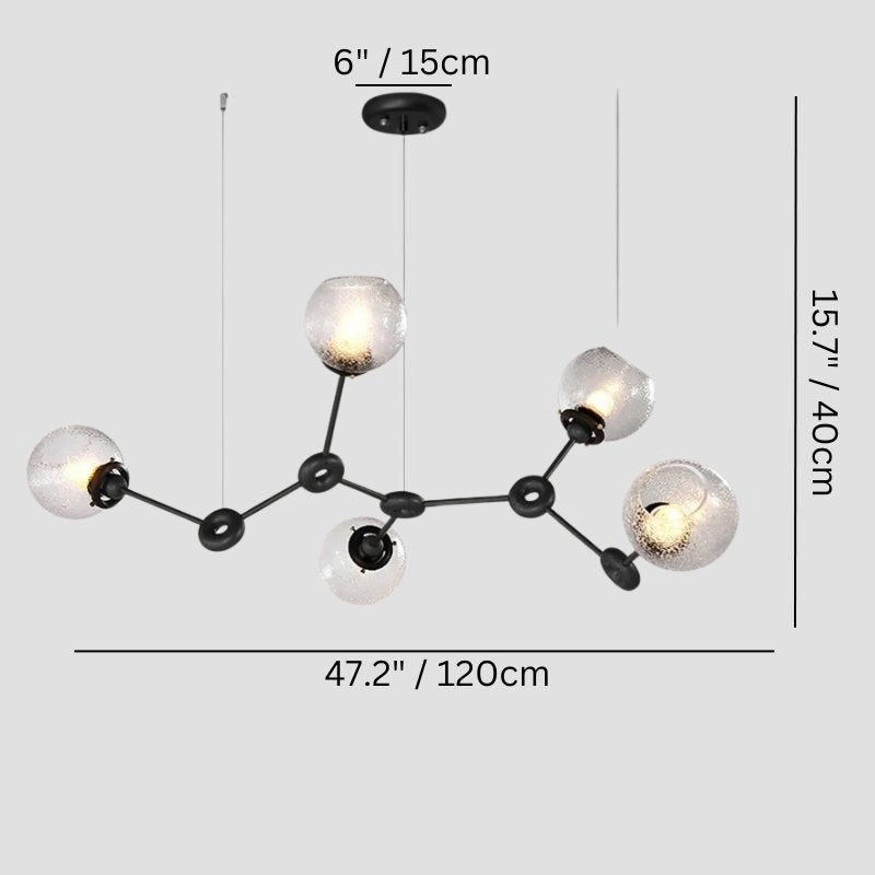 Elegant Jyotish indoor chandelier with intricate design, hanging from a ceiling with warm lighting, by Residence Supply.