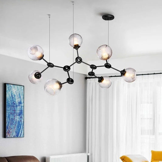 Residence Supply Jyotish indoor chandelier with intricate design and multiple hanging lights for elegant home lighting.