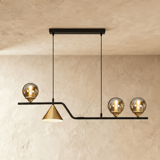 Modern Kira Pendant Light by Residence Supply featuring a sleek design with a glass shade and metallic accents.