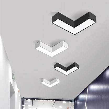 Korner ceiling light by Residence Supply, modern LED fixture with sleek design and matte finish, mounted on a ceiling.