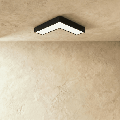 Korner ceiling light by Residence Supply featuring a modern design with a sleek, minimalist metal frame and soft ambient lighting