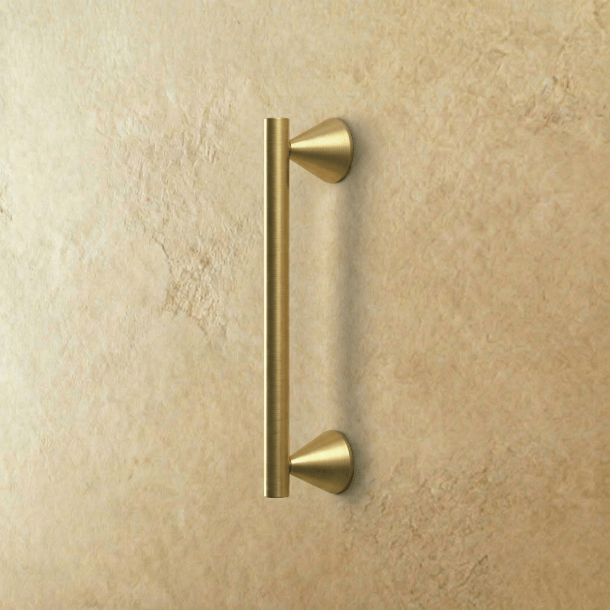Crystal knob and pull bar from Residence Supply, shown on a cabinet door with a sleek, transparent glass finish.