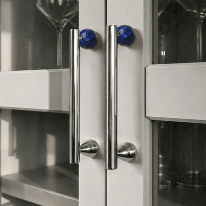 Crystal knob and pull bar for cabinets from Residence Supply, showcasing elegant hardware for home and garden furniture.