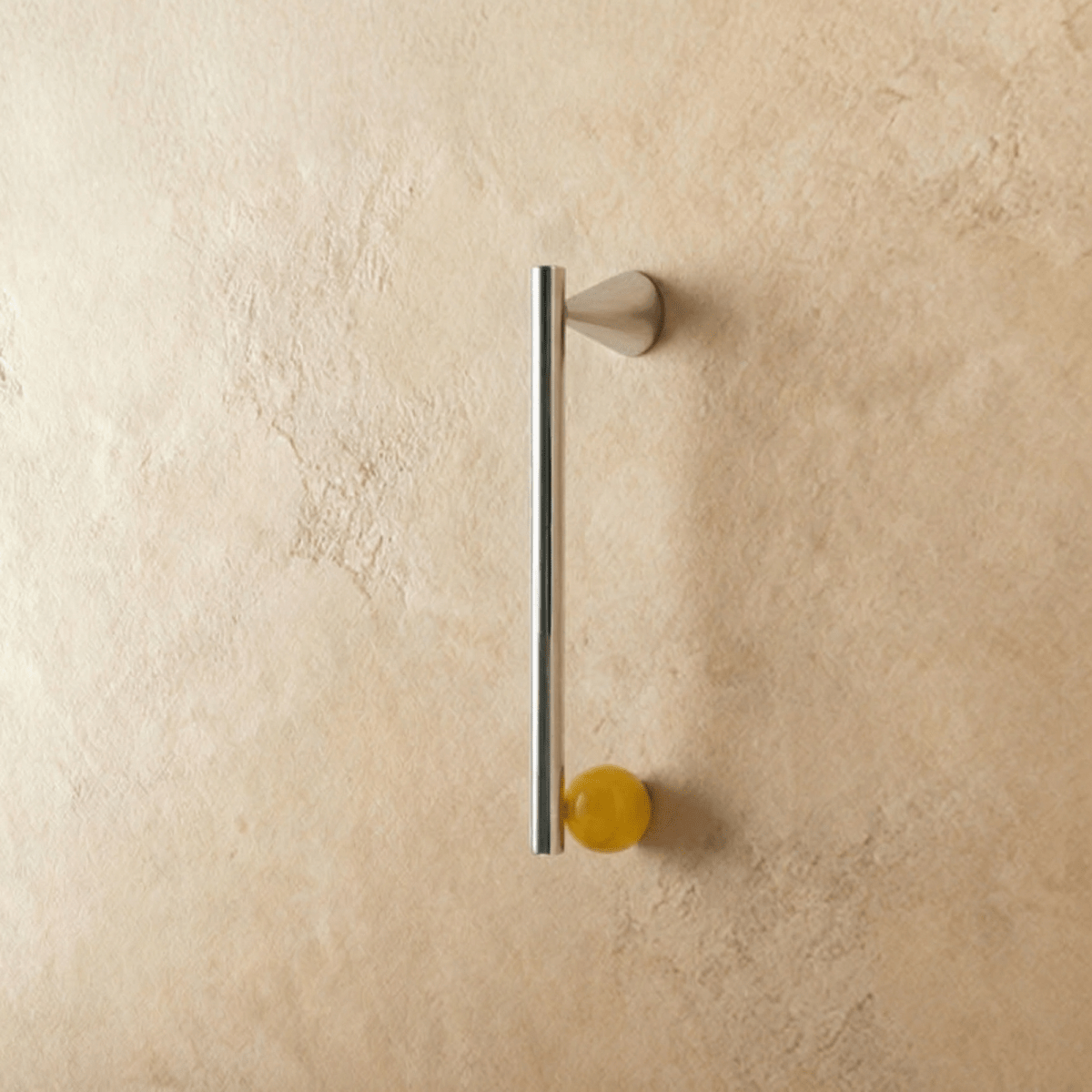 Crystal knob and pull bar from Kwam, made of clear glass, attached to a metal cabinet handle for home and garden use.