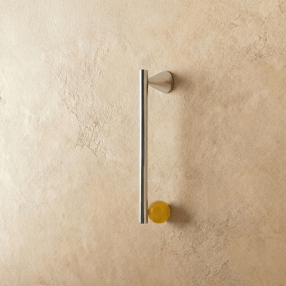 Crystal knob and pull bar from Kwam, made of clear glass, attached to a metal cabinet handle for home and garden use.