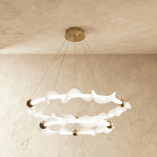 Kyria Chandelier by Residence Supply featuring a modern design with multiple light bulbs and sleek metal frame.