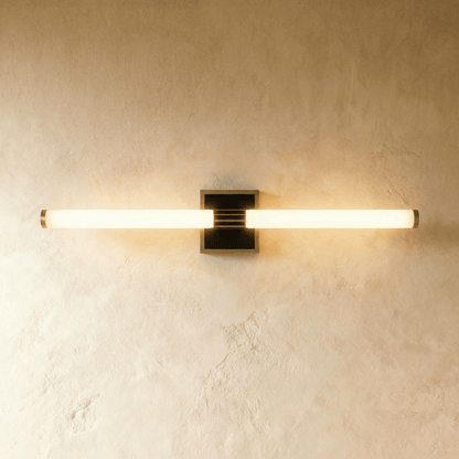Modern Lacto Wall Lamp by Residence Supply featuring a sleek design and warm lighting for contemporary interiors.