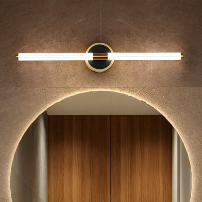 Modern Lacto Wall Lamp by Residence Supply featuring a sleek design and warm lighting for contemporary home decor.