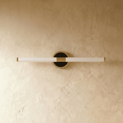 Modern Lacto Wall Lamp by Residence Supply featuring a sleek design and warm lighting for contemporary home decor.
