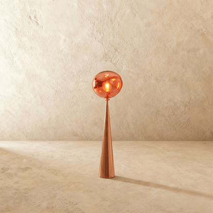Residence Supply lava floor lamp with flowing molten lava sculpture on a tall stand, perfect for modern living room décor.