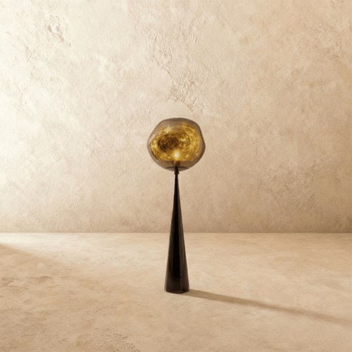 Residence Supply lava floor lamp featuring a tall, sculptural base and flowing lava glass for stylish ambient lighting.