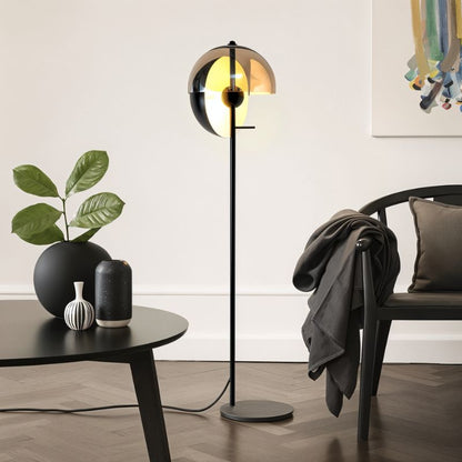 Modern Layers Floor Lamp by Residence Supply with multiple layered cylindrical shades and sleek metal stand.