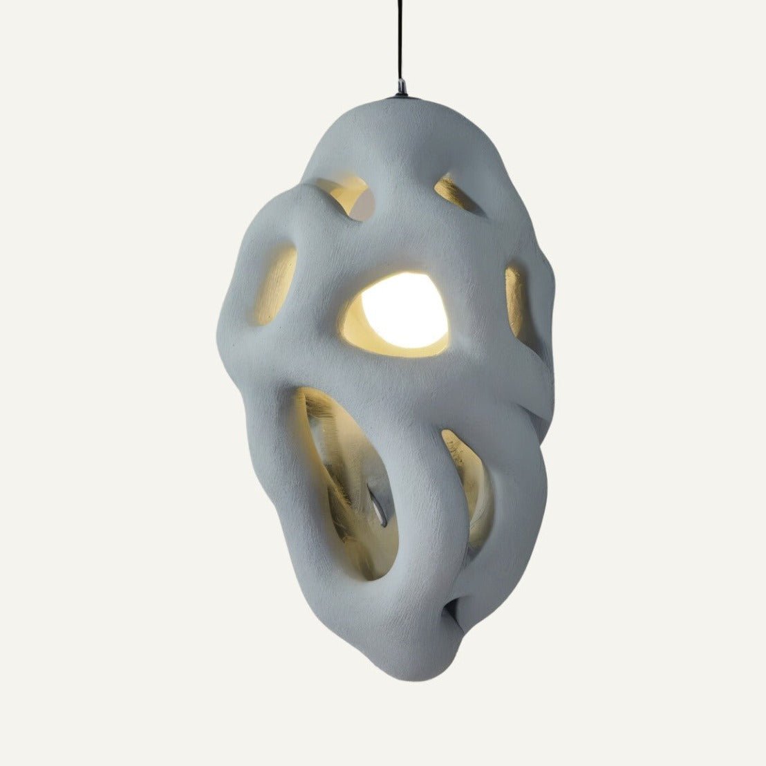 Lehota Pendant Light by Residence Supply hanging from ceiling with a modern design and warm lighting.