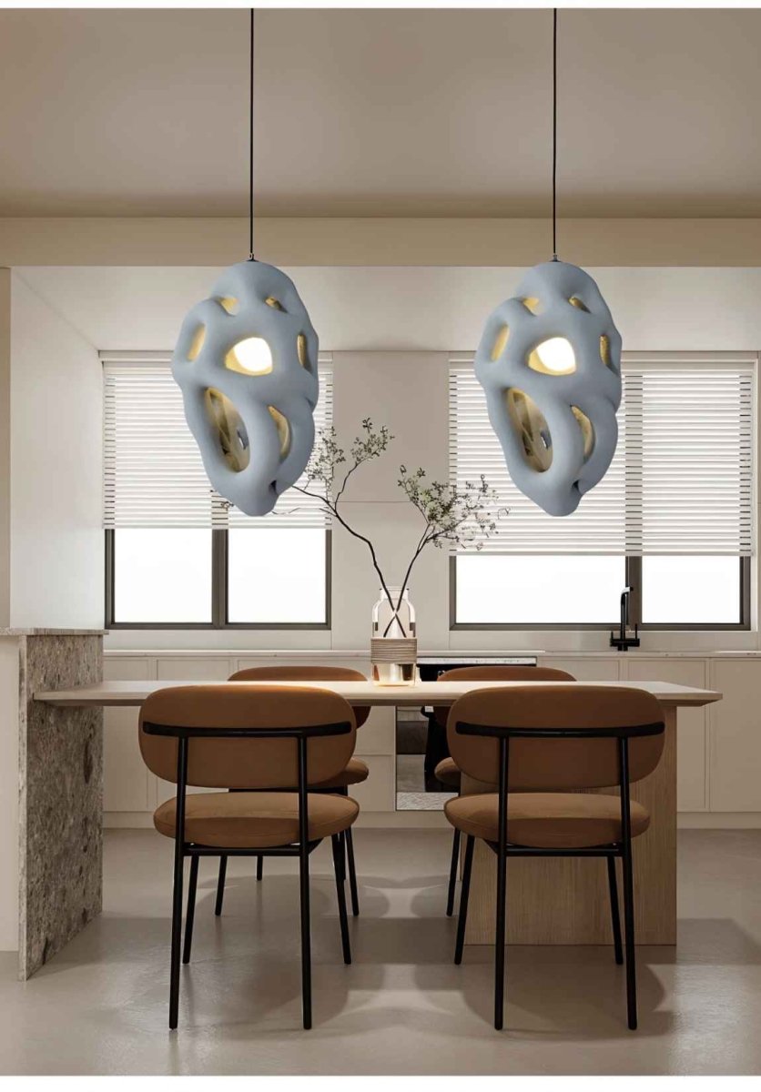 Lehota Pendant Light by Residence Supply hanging from ceiling with a sleek modern design and warm lighting.