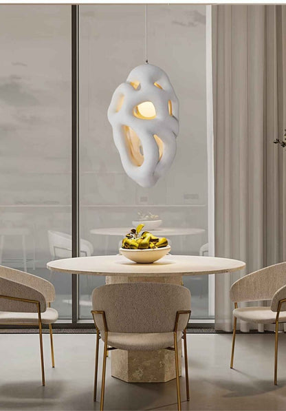 Lehota Pendant Light by Residence Supply hanging from ceiling with modern design and warm lighting in a contemporary interior.