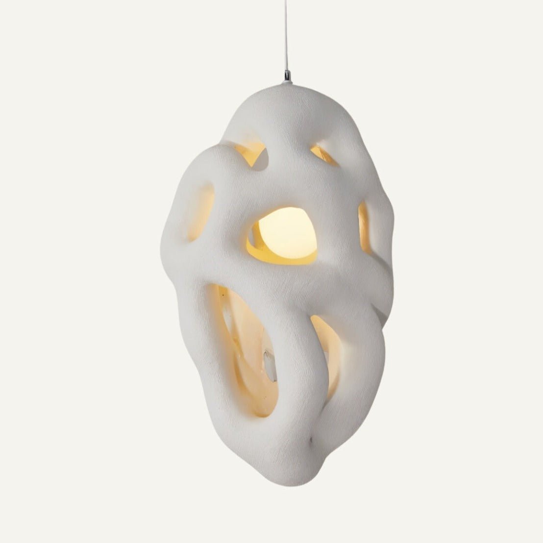 Lehota Pendant Light by Residence Supply hanging from ceiling with modern design and warm lighting in a contemporary space