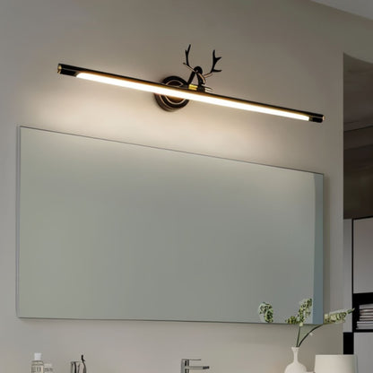 Modern Leios Wall Lamp by Residence Supply mounted on a white wall, featuring a sleek, minimalist design with a curved metal arm.