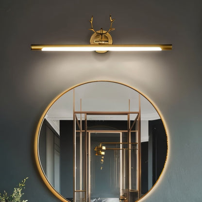 Leios wall lamp by Residence Supply featuring a modern design with a sleek metal finish and adjustable arm, mounted on a white wall.